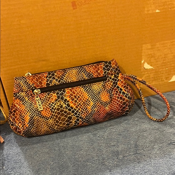 Maxx New York Handbags - Maxx New York Stylish Snake Print Clutch